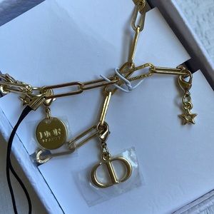 NIB Dior gold stars phone charm